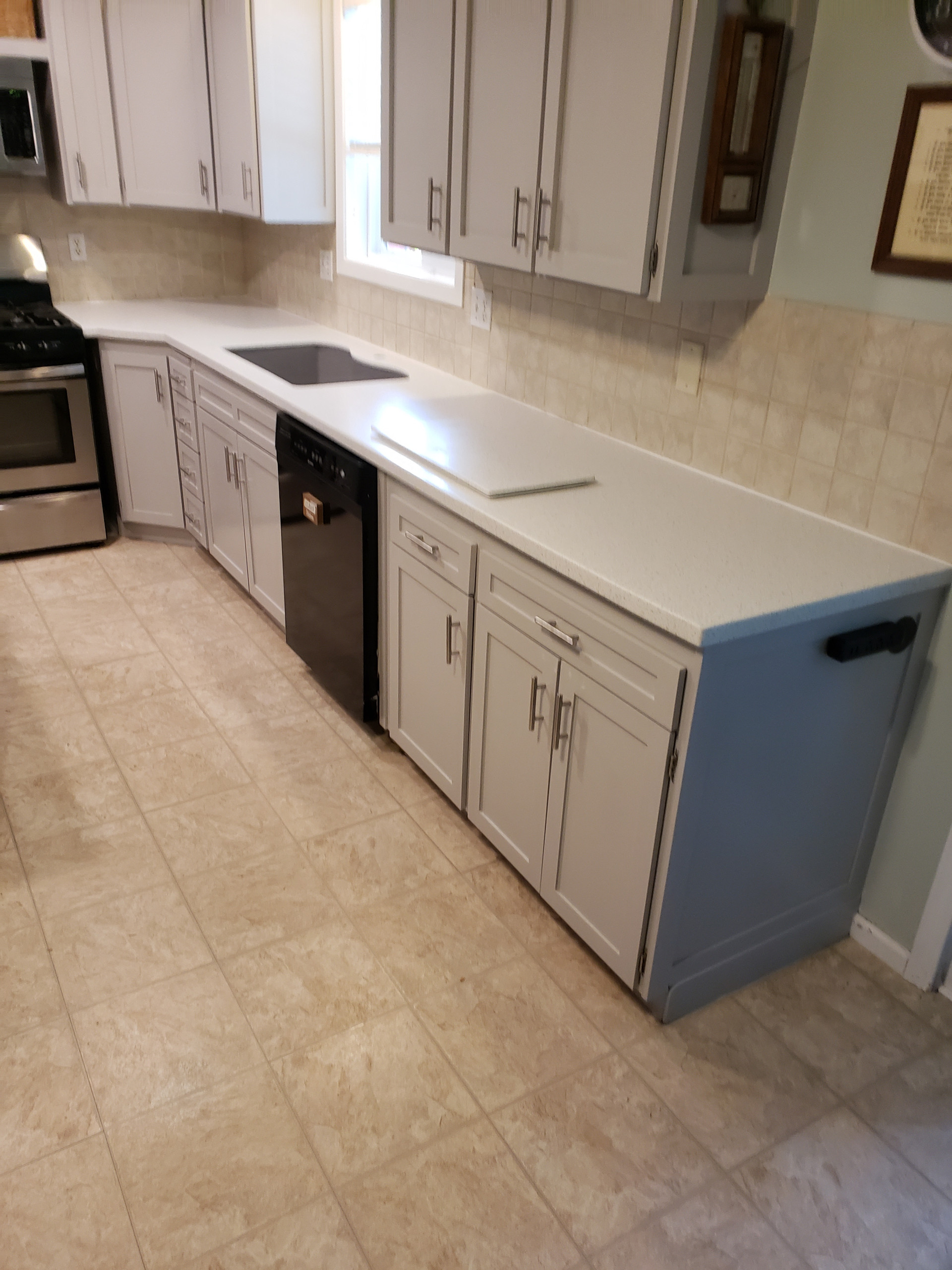 Solid Surface Countertops with All Wood Cabinets