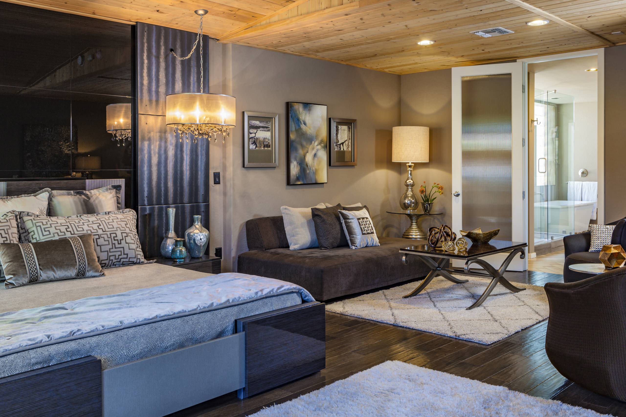 Bedroom - large modern master dark wood floor and brown floor bedroom idea in Phoenix with gray walls