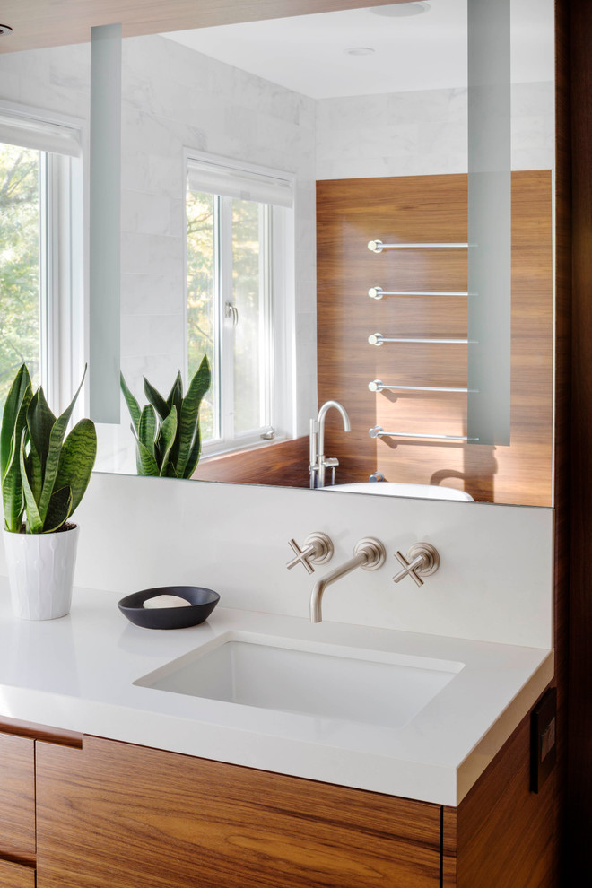 Design ideas for a contemporary bathroom in Boston with a corner tub.
