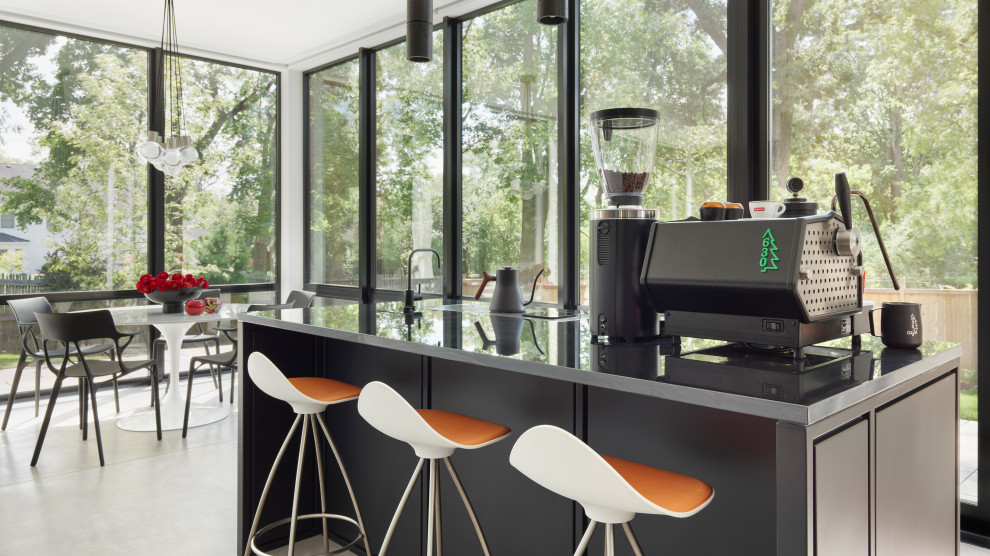 North Shore Less is More - This unique element is a custom barista bar designed exclusively for our clients passion for coffee!  The panels are rolled steel, double black quartzite countertop, and an amazing array of custom grinders, kettles, and other array of amazing accoutrements!