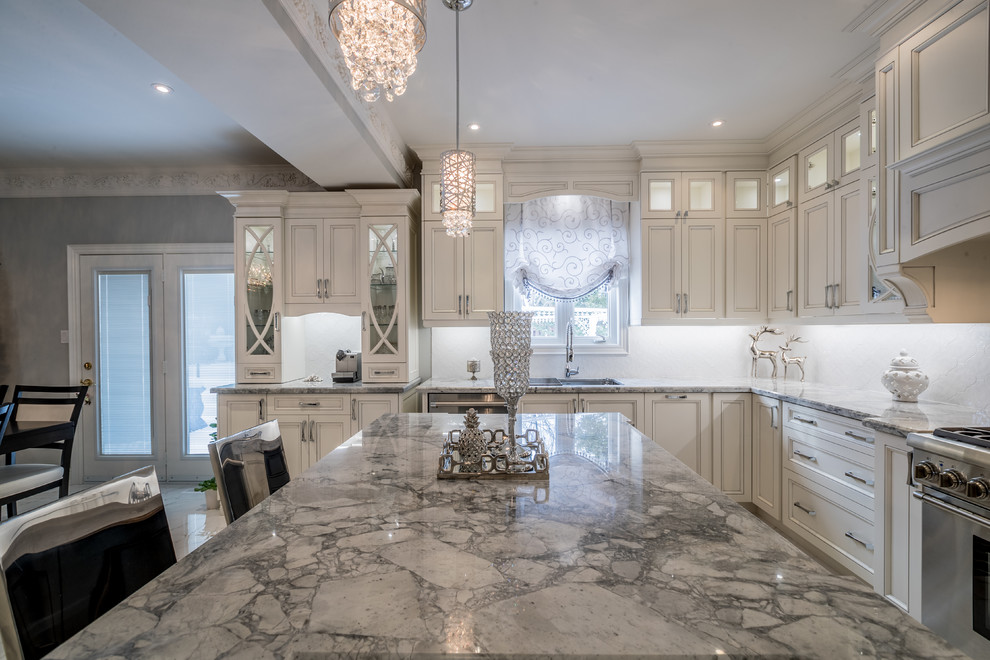 Example of a transitional kitchen design in Toronto