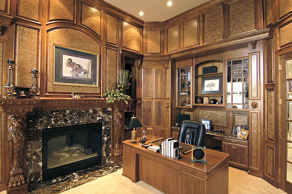 Example of a huge transitional freestanding desk carpeted study room design in Omaha with brown walls, a standard fireplace and a stone fireplace