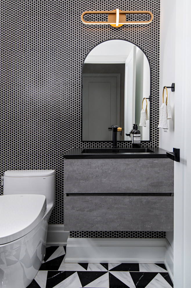 This is an example of a small modern cloakroom in Toronto with flat-panel cabinets, grey cabinets, a one-piece toilet, black tiles, ceramic tiles, white walls, porcelain flooring, a submerged sink, quartz worktops, black floors, black worktops and a floating vanity unit.