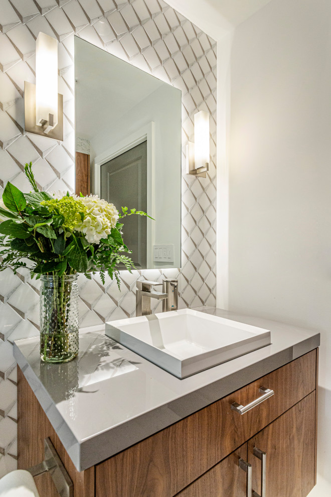 This is an example of a mid-sized contemporary bathroom in San Diego with flat-panel cabinets, white cabinets, an alcove shower, grey walls, vinyl floors, a vessel sink, onyx benchtops, brown floor, yellow benchtops, a single vanity, a floating vanity and wood walls.