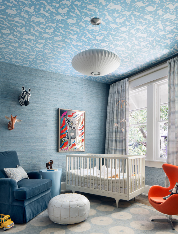 Mid-sized nursery in Houston with blue walls, carpet and blue floor for boys.