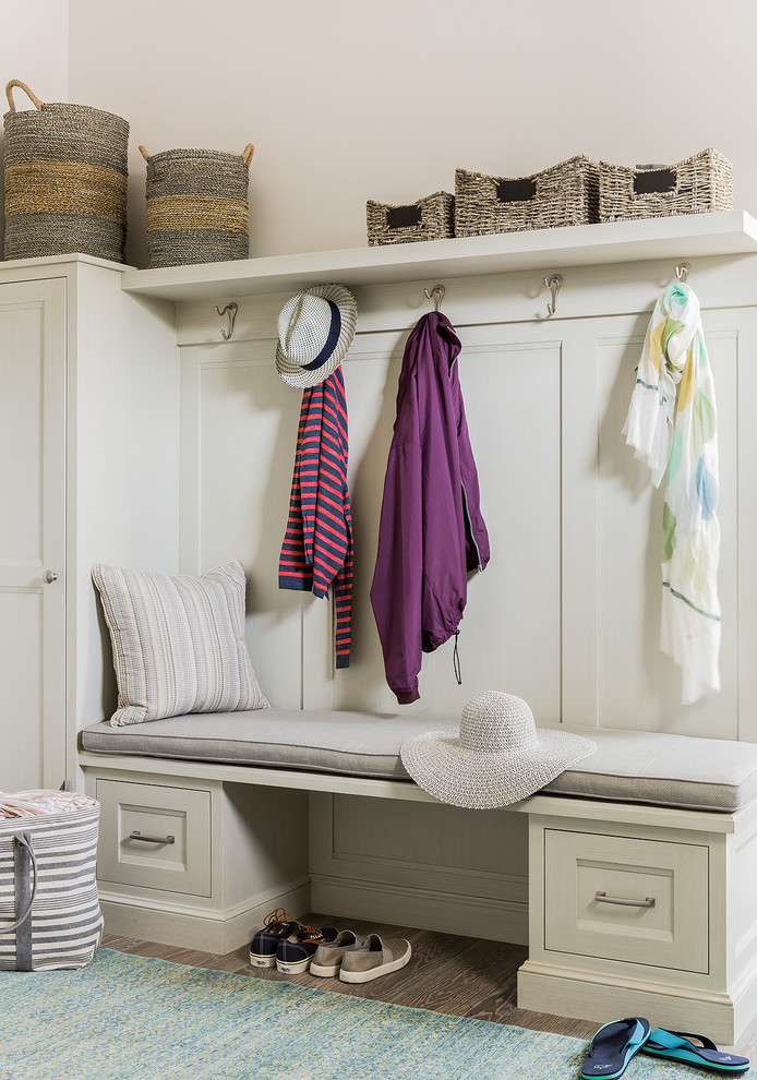 This is an example of a beach style mudroom in Boston.
