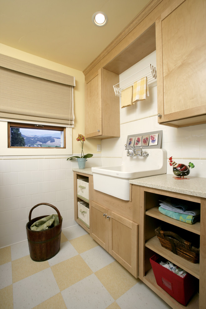 Traditional laundry room in San Francisco with a farmhouse sink.