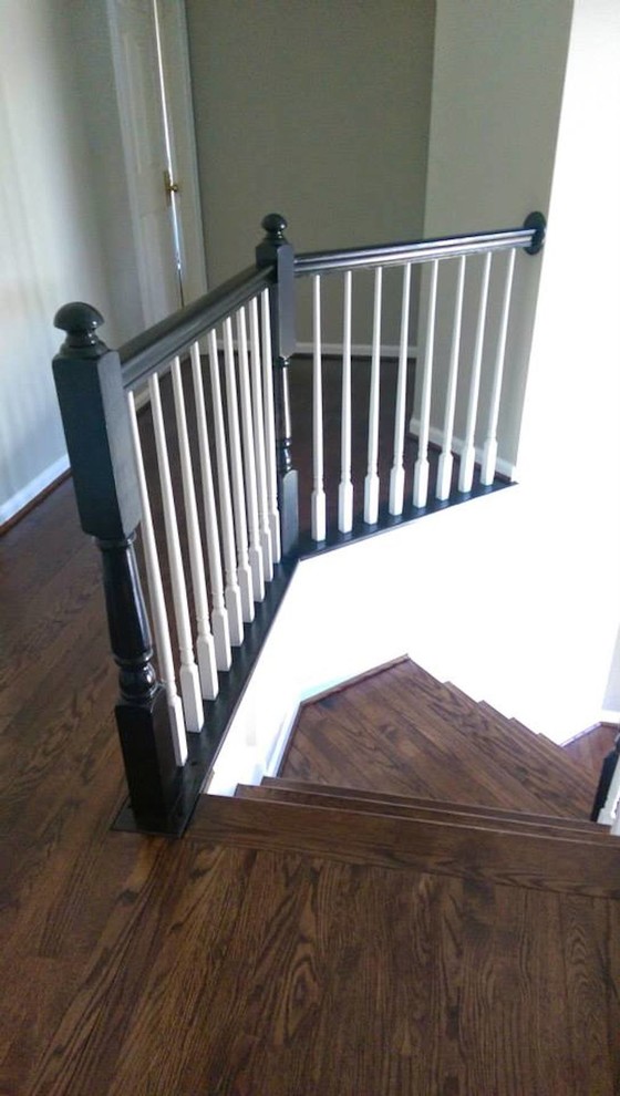 Staircase - mid-sized transitional wooden curved staircase idea in Baltimore with wooden risers