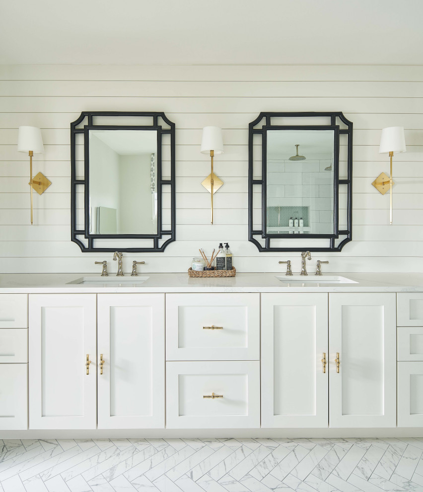 Photo of a large nautical ensuite bathroom in Charlotte with shaker cabinets, white cabinets, a corner shower, white walls, porcelain flooring, a submerged sink, engineered stone worktops, white floors, a hinged door, white worktops, a wall niche, double sinks, a built in vanity unit and tongue and groove walls.