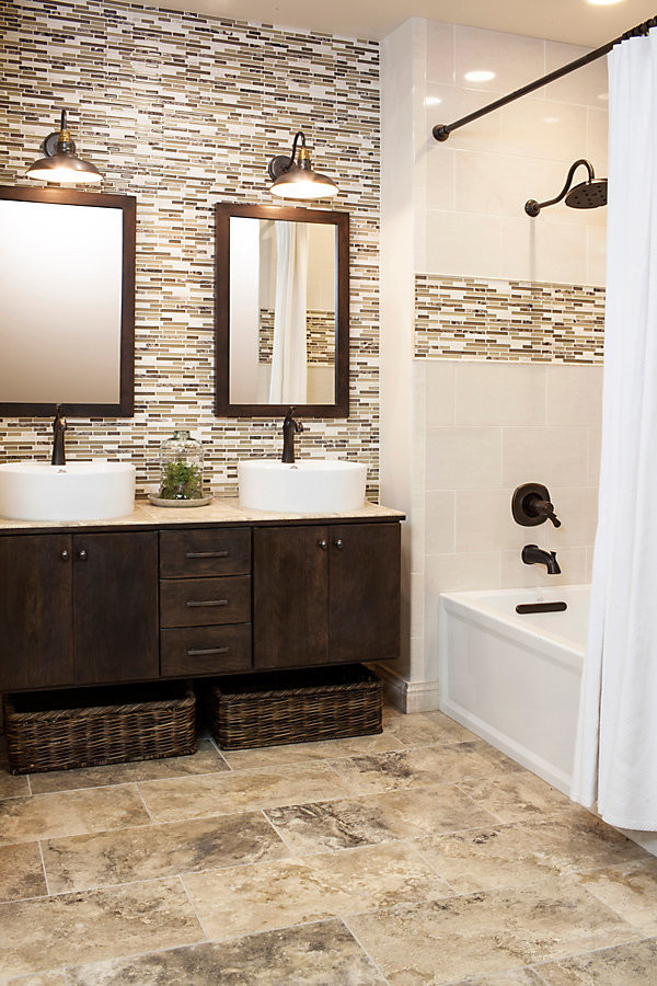 Design ideas for a mid-sized transitional 3/4 bathroom in San Francisco with flat-panel cabinets, dark wood cabinets, a shower/bathtub combo, multi-coloured tile, a vessel sink, beige floor, a shower curtain, matchstick tile, brown walls, porcelain floors, tile benchtops and beige benchtops.