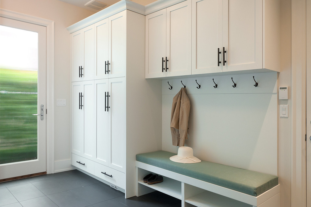 Inspiration for a transitional mudroom in Vancouver with white walls, a single front door and a glass front door.