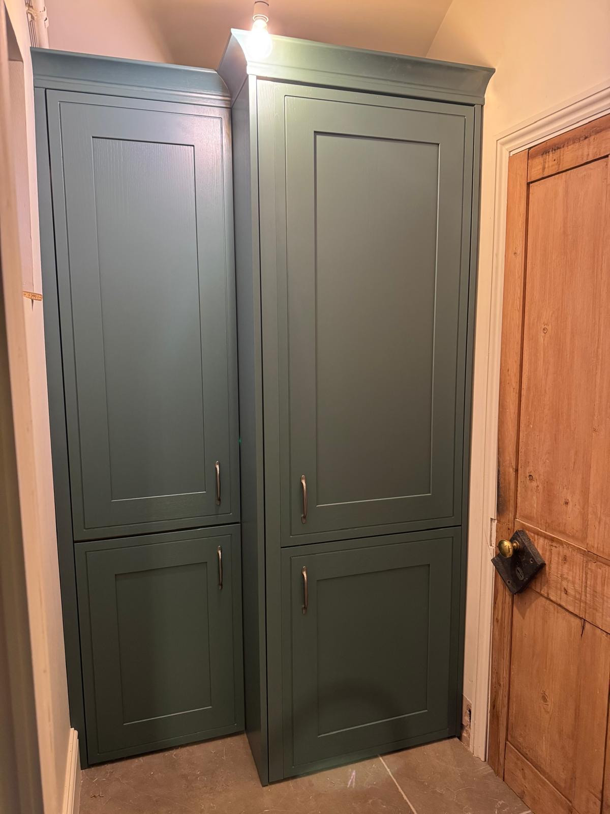 A Dark Coloured Gally Kitchen