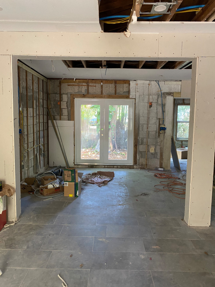 Inspiration for a transitional dining room remodel in Miami