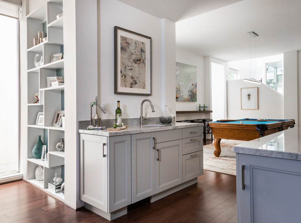 Example of a transitional home design design in Houston