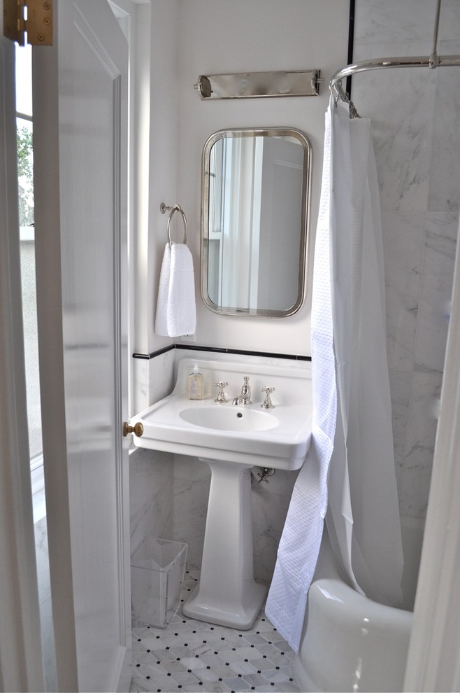 Design ideas for a small traditional master bathroom in New York with a pedestal sink, a corner tub, a shower/bathtub combo, white tile, porcelain tile, white walls and marble floors.