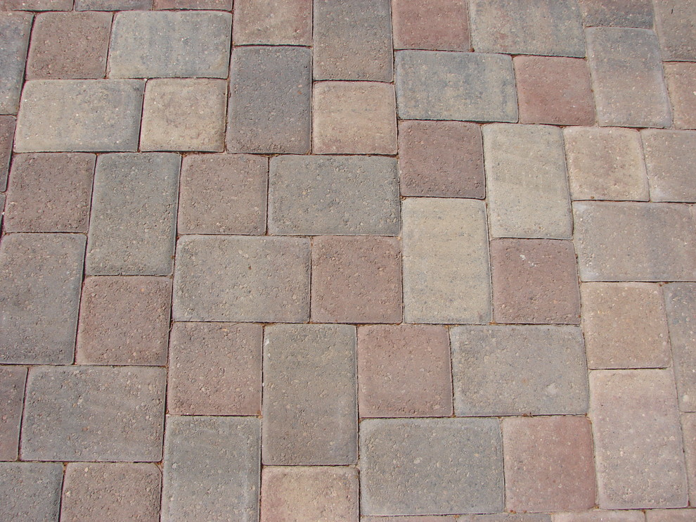 This is an example of a traditional garden in Miami with brick pavers.