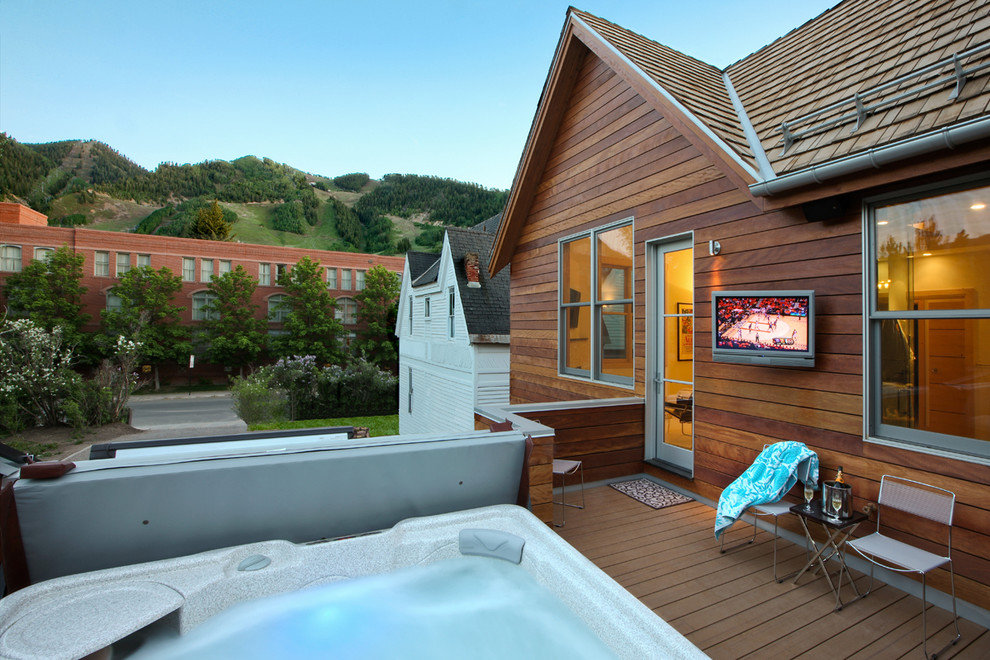 Transitional backyard deck photo in Denver