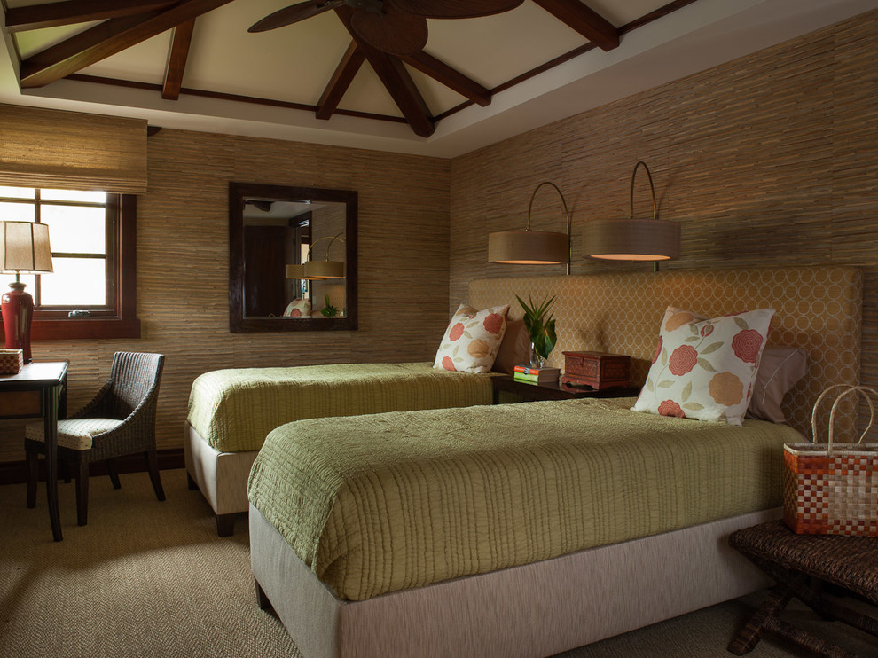 This is an example of a tropical guest bedroom in Hawaii with carpet and no fireplace.