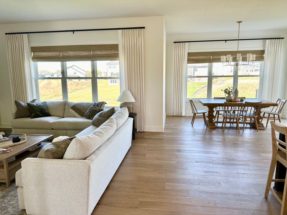 Stationary Drapery Panels with Woven Woods Light Filtering Shades