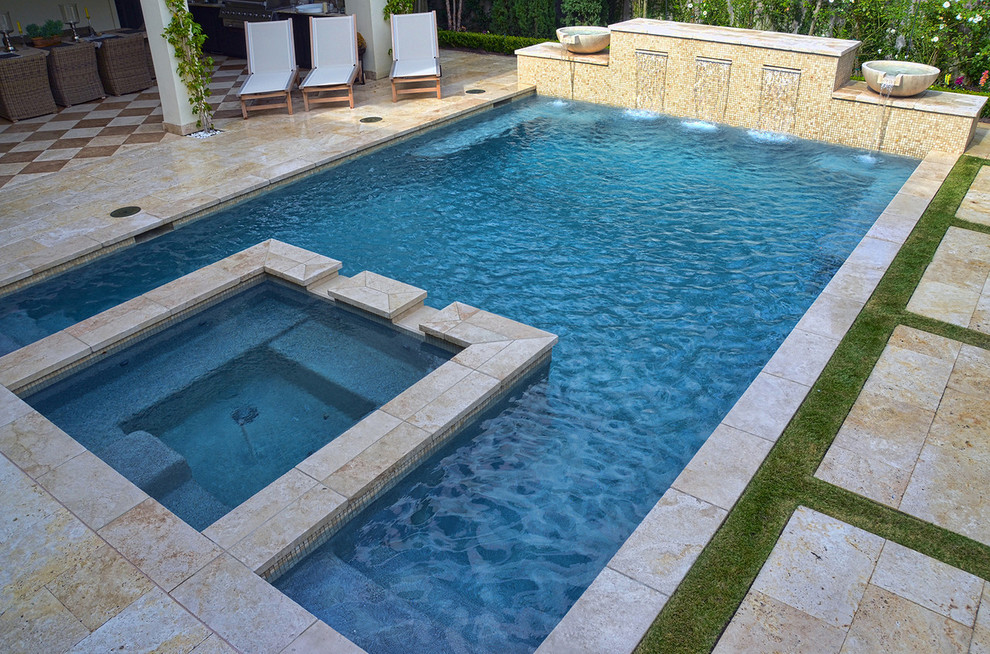 Example of a mid-sized transitional backyard rectangular and tile pool fountain design in Houston