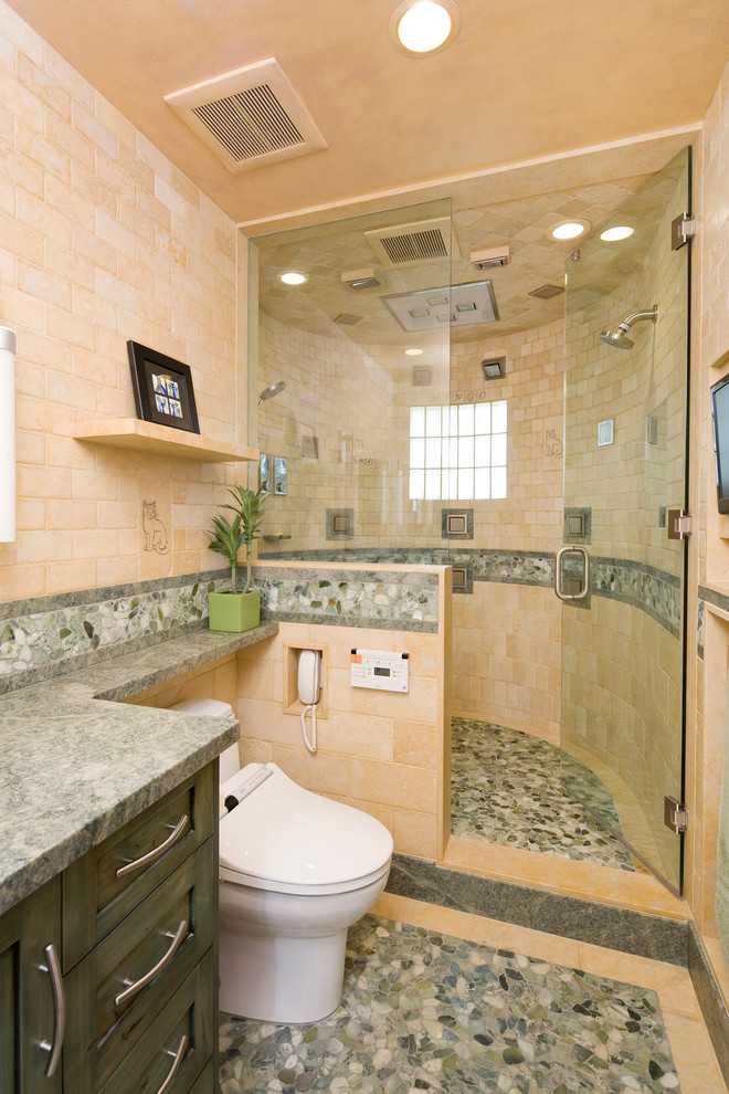 Inspiration for an eclectic green tile and stone tile corner shower remodel in Santa Barbara with shaker cabinets, green cabinets, a bidet, granite countertops and beige walls