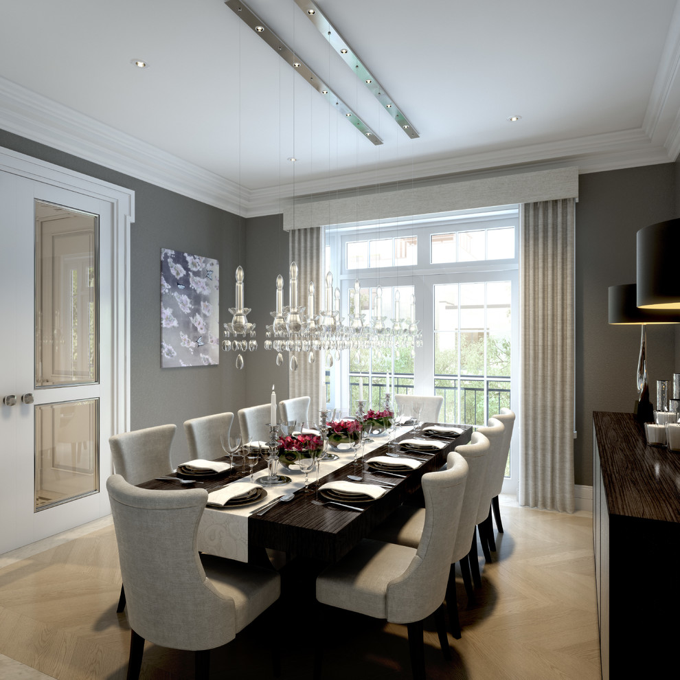 Design ideas for a transitional separate dining room in London with grey walls, light hardwood floors and beige floor.
