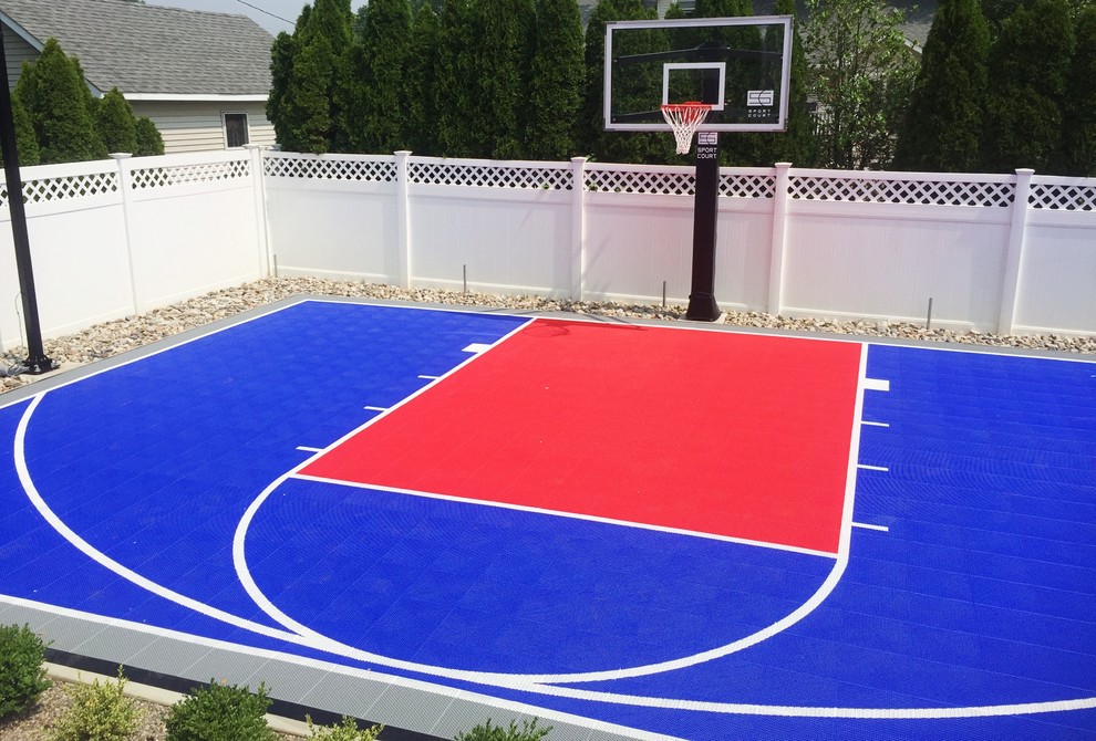 Photo of a small modern backyard full sun outdoor sport court in New York with with outdoor playset.