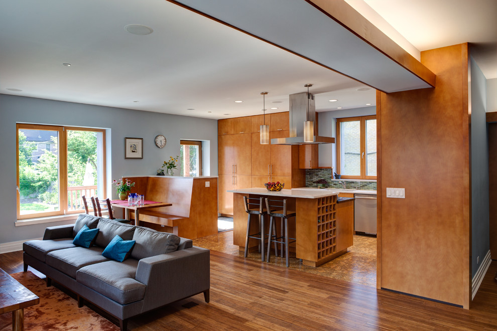 Inspiration for a transitional eat-in kitchen remodel in Chicago with an island