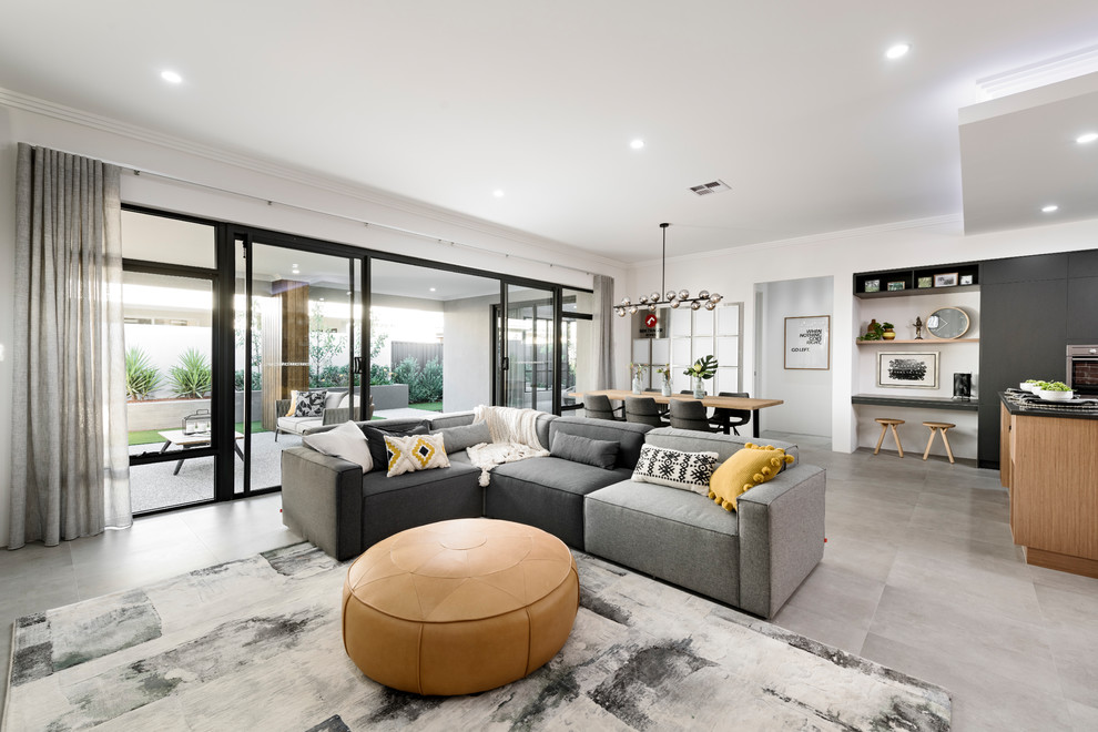 This is an example of a mid-sized contemporary open concept living room in Perth with white walls, grey floor and ceramic floors.