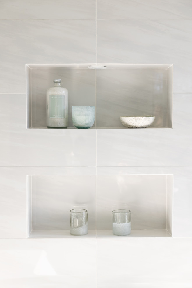 Huge minimalist master white tile and porcelain tile porcelain tile, white floor and double-sink walk-in shower photo with flat-panel cabinets, dark wood cabinets, an undermount tub, a wall-mount toilet, white walls, an undermount sink, quartz countertops, a hinged shower door, white countertops and a floating vanity