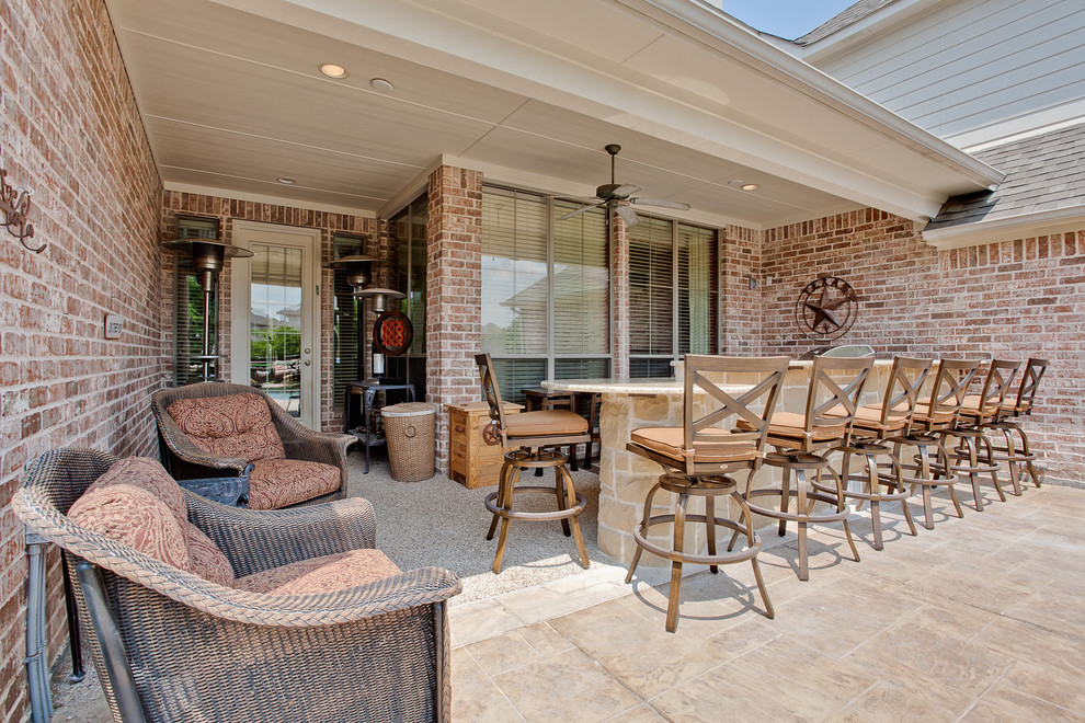 Traditional patio in Dallas with an outdoor kitchen.
