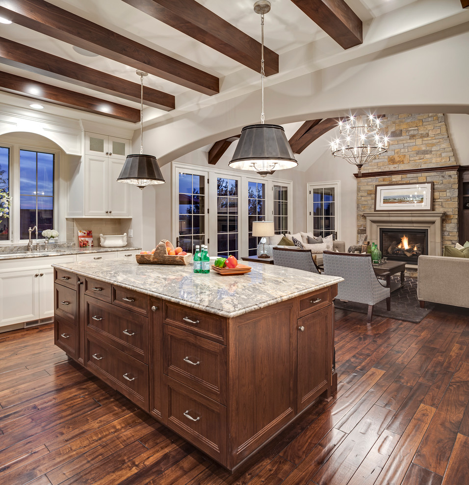 Design ideas for a traditional open plan kitchen in Minneapolis with white cabinets, quartzite benchtops, beige splashback, cement tile splashback, panelled appliances, dark hardwood floors and with island.
