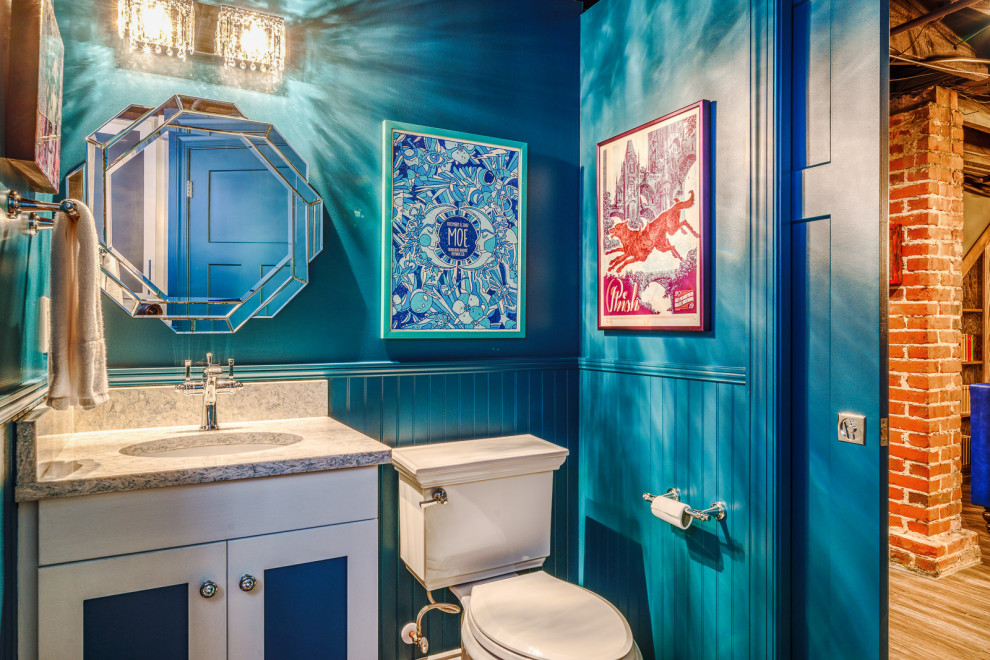 This is an example of an eclectic powder room in Other.