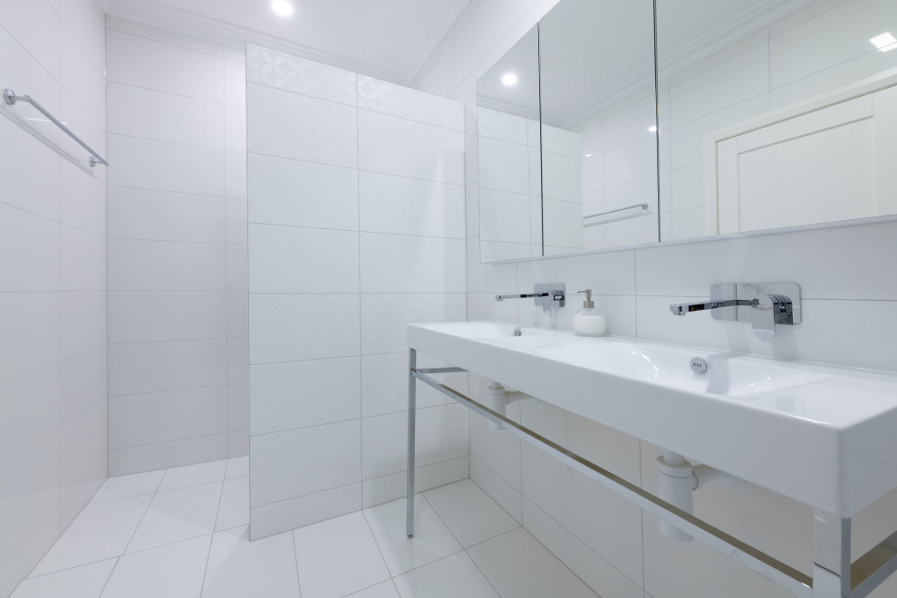 Mid-sized contemporary master bathroom in Adelaide with open cabinets, white cabinets, an alcove shower, a bidet, white tile, ceramic tile, white walls, ceramic floors, a drop-in sink, engineered quartz benchtops, white floor, an open shower and white benchtops.