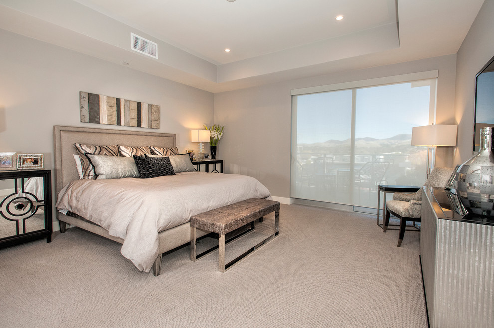 This is an example of a mid-sized modern master bedroom in San Francisco with grey walls, carpet and no fireplace.