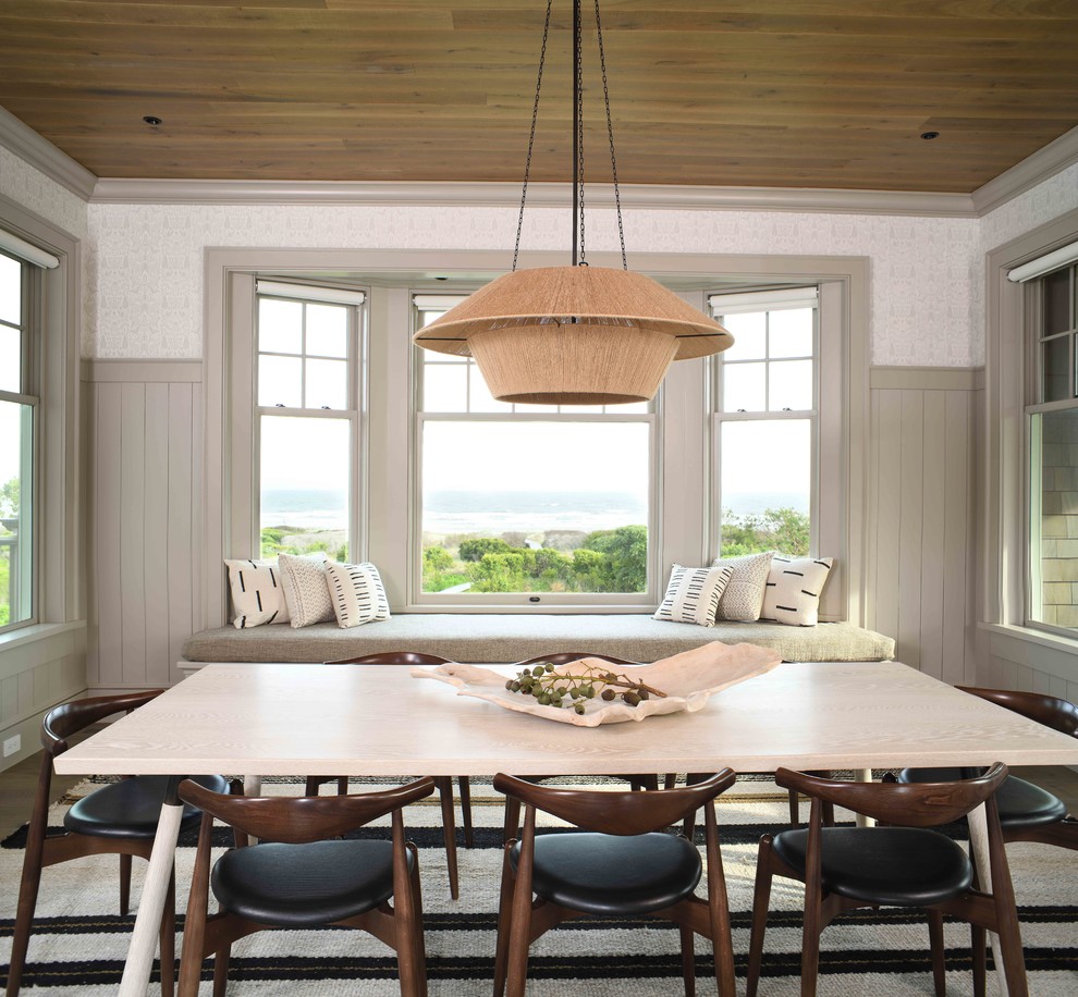 Design ideas for a beach style dining room in Charleston with multi-coloured walls, dark hardwood floors and no fireplace.