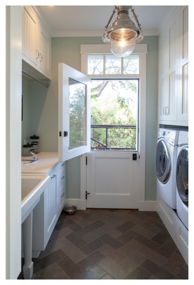 This is an example of a beach style laundry room in San Diego.