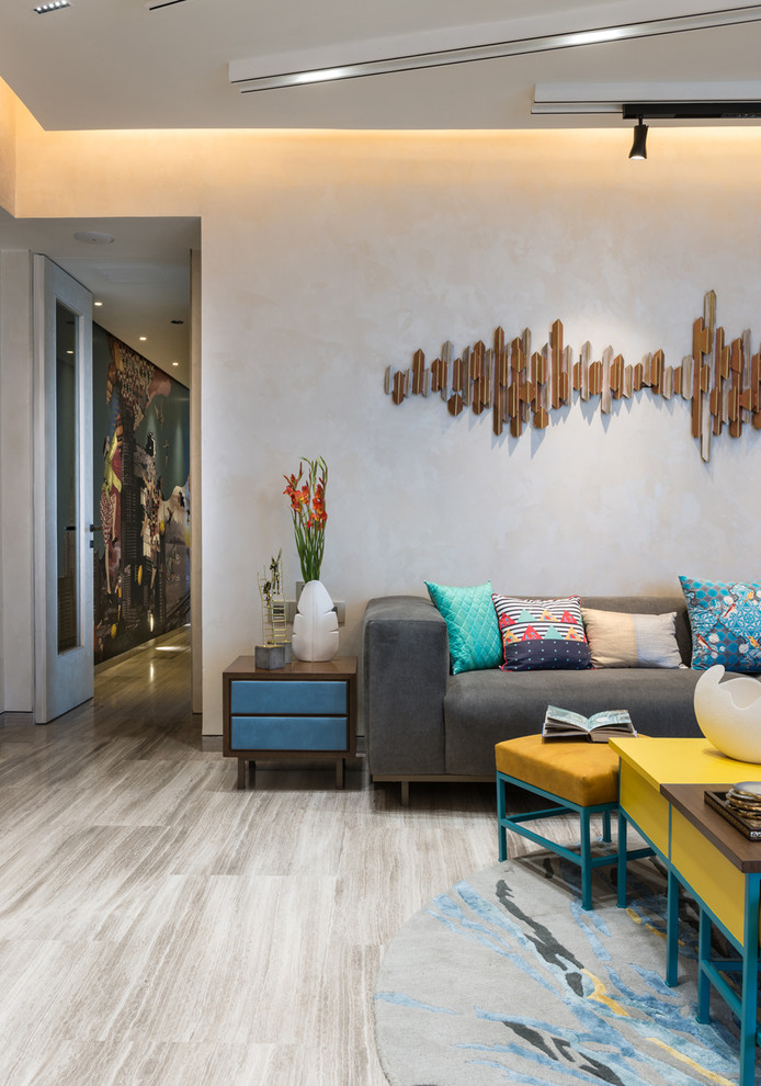 Photo of a contemporary living room in Mumbai.