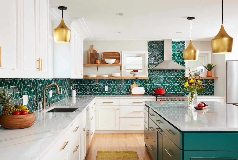 Large transitional l-shaped open concept kitchen photo in Minneapolis with beaded inset cabinets, white cabinets, blue backsplash, ceramic backsplash and an island