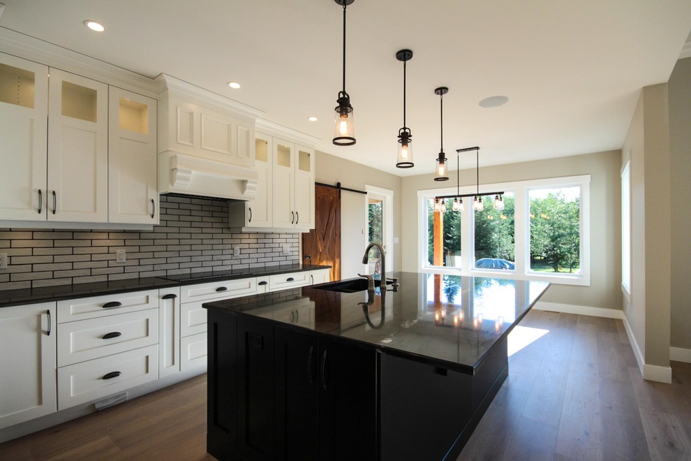 Example of a transitional kitchen design in Vancouver