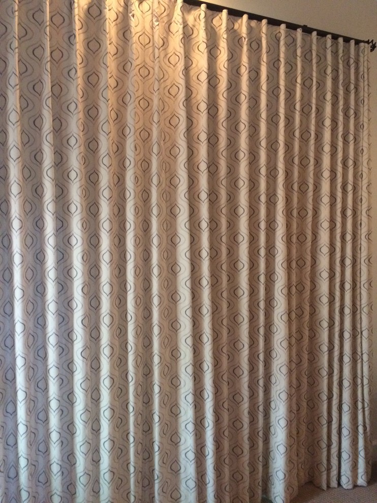 Mid-sized transitional master carpeted home design photo with beige walls