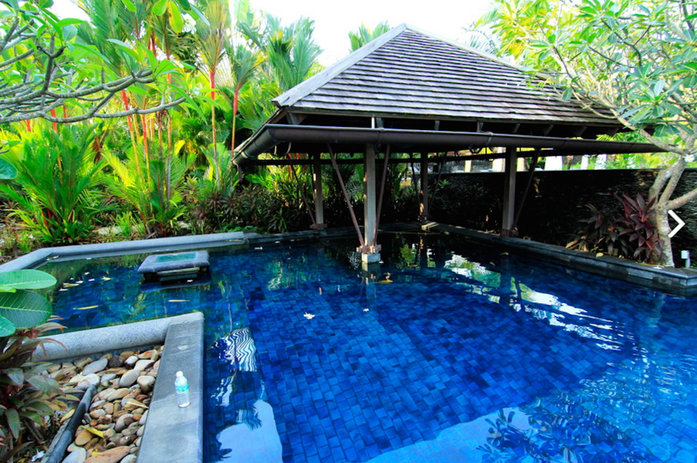 Pool - large backyard custom-shaped pool idea in DC Metro
