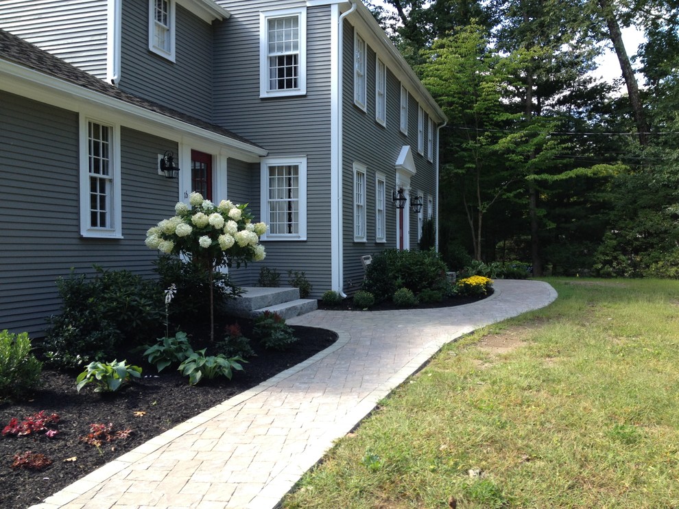 Mid-sized traditional front yard partial sun garden in Boston with a garden path and concrete pavers.