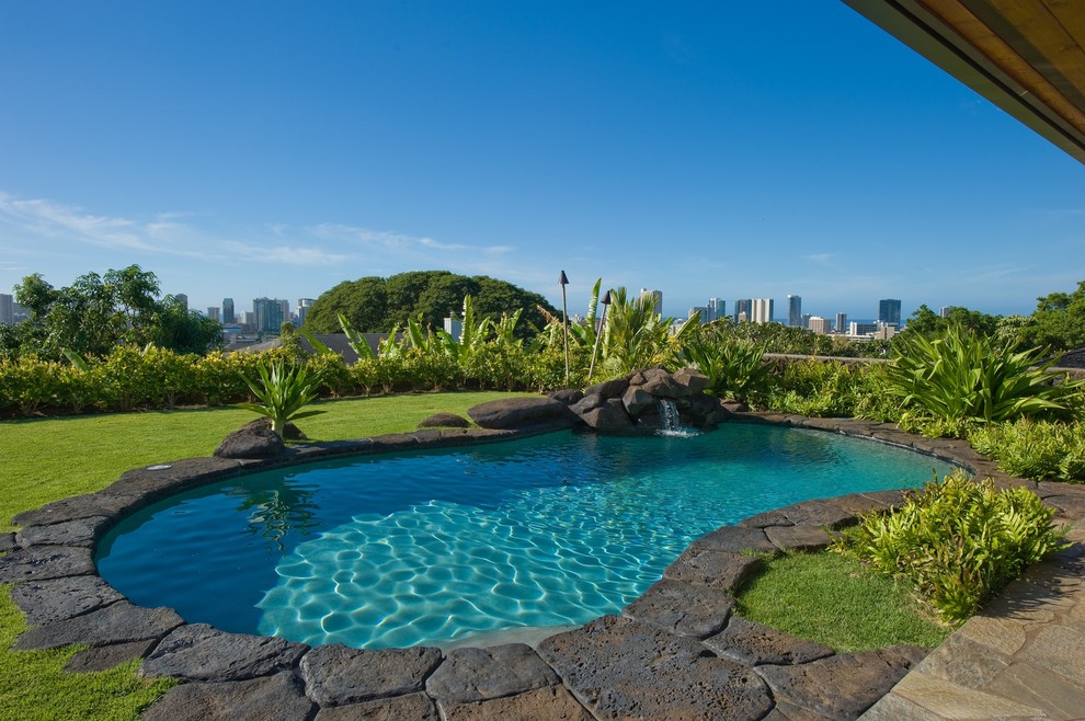 This is an example of a tropical custom-shaped pool in Hawaii.