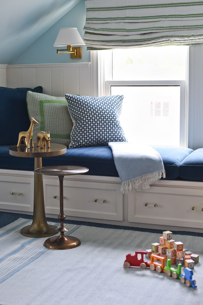 Example of a mid-sized transitional gender-neutral carpeted playroom design in Houston with blue walls