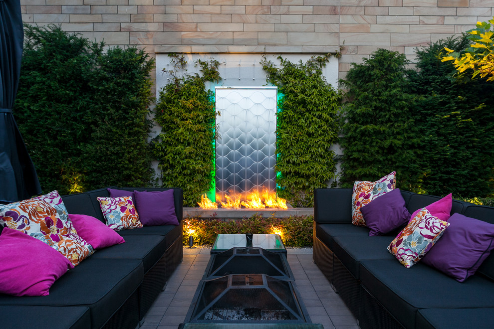 Design ideas for an eclectic patio in Cheshire with with fireplace.
