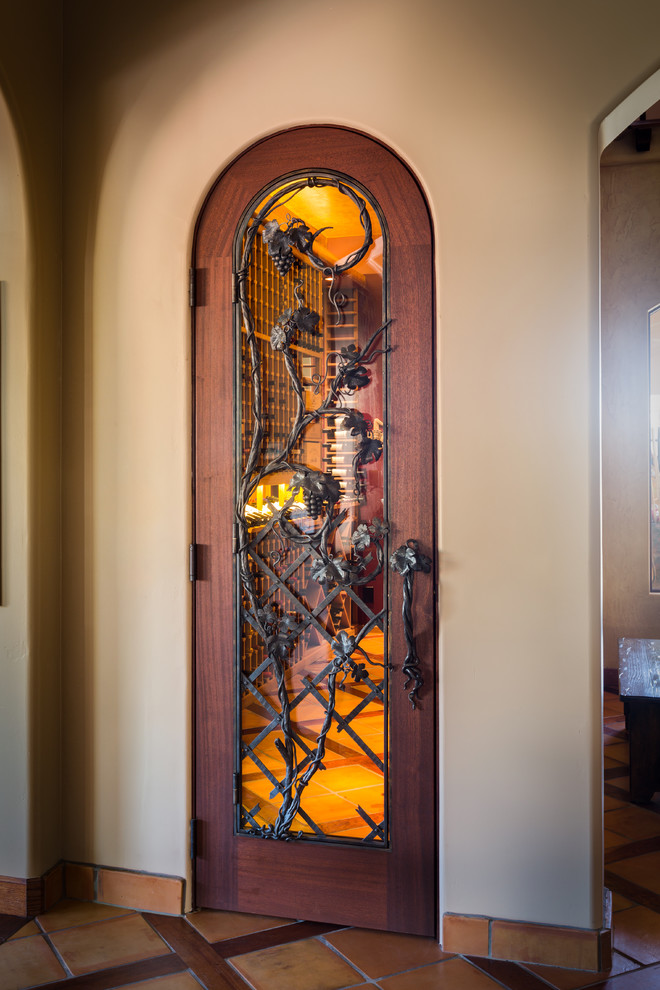 Huge trendy ceramic tile wine cellar photo in Phoenix