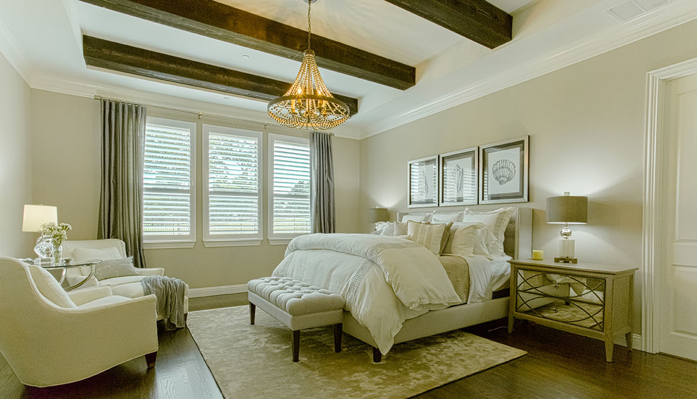 This is an example of a mid-sized beach style master bedroom in Dallas with grey walls, dark hardwood floors, no fireplace and brown floor.