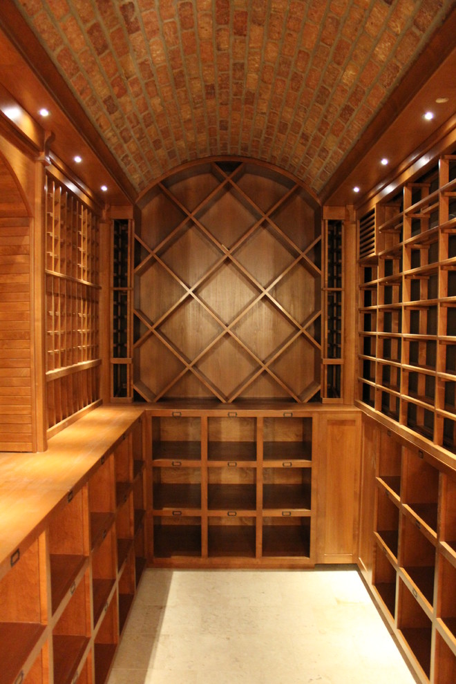 Photo of an expansive traditional wine cellar in Denver with diamond bins.