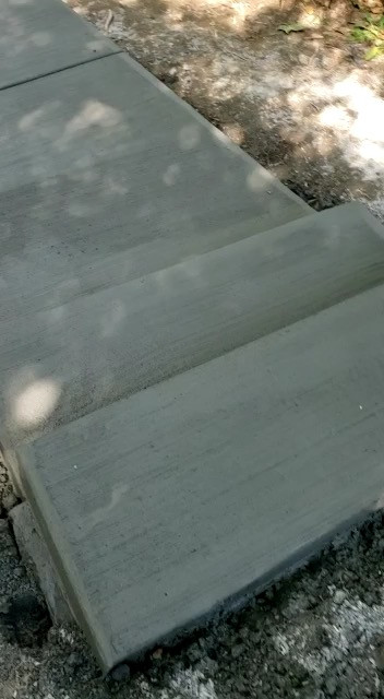Elizabeth’s concrete stamp and steps to axess the river